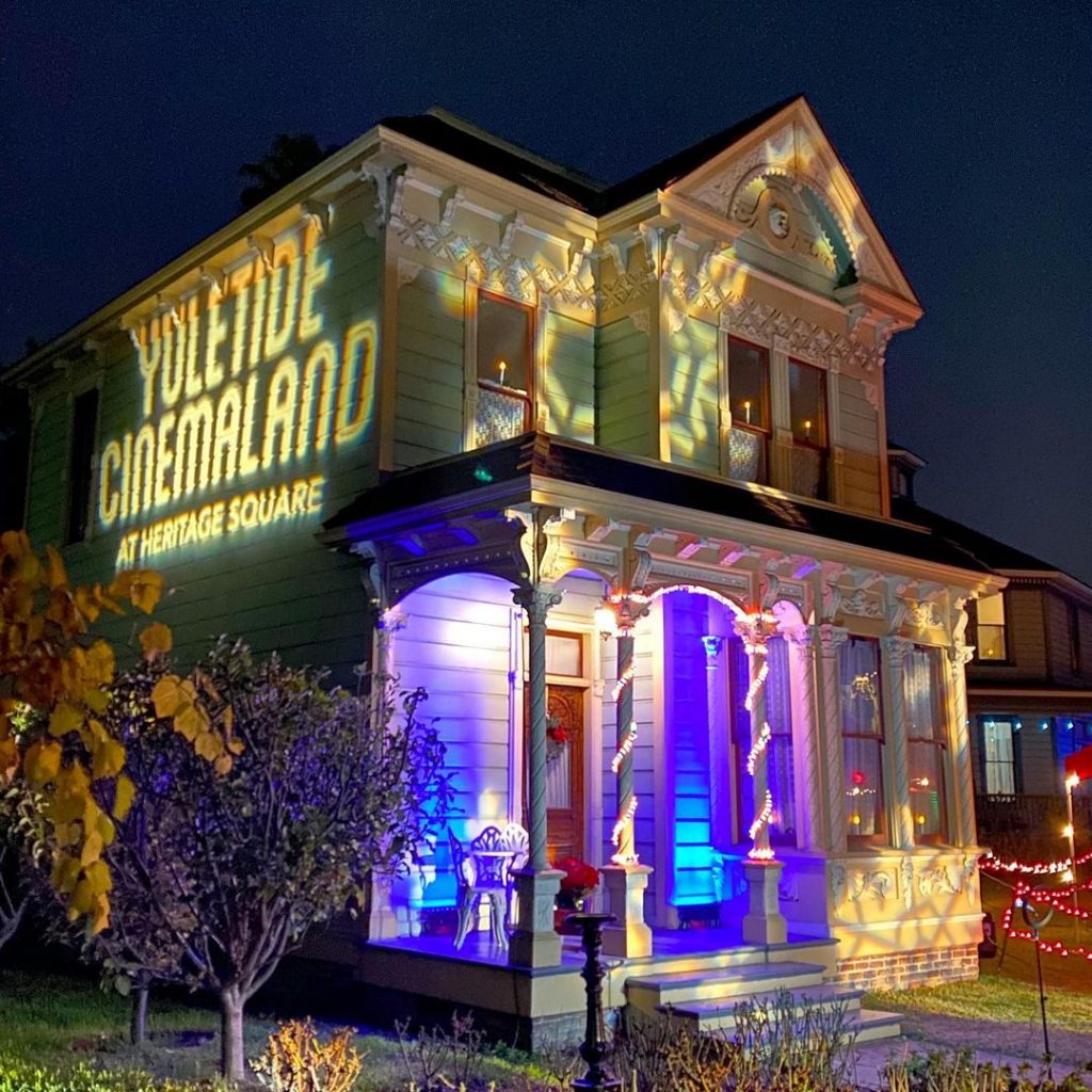 A Vitorian home withh festive projections at Yuletide Cinemaland in Heritage Museum Square 