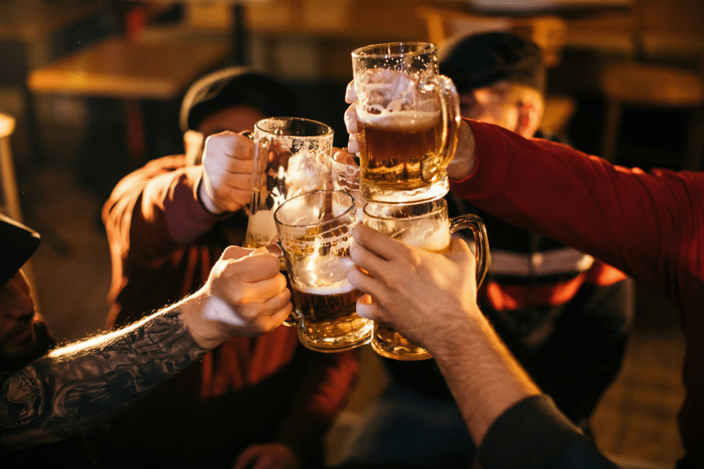 People cheering beers - News You Might Have Missed