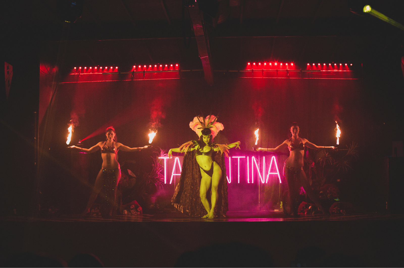 Burlesque performers dance during Tarantina show, one of the best things to do in Los Angeles