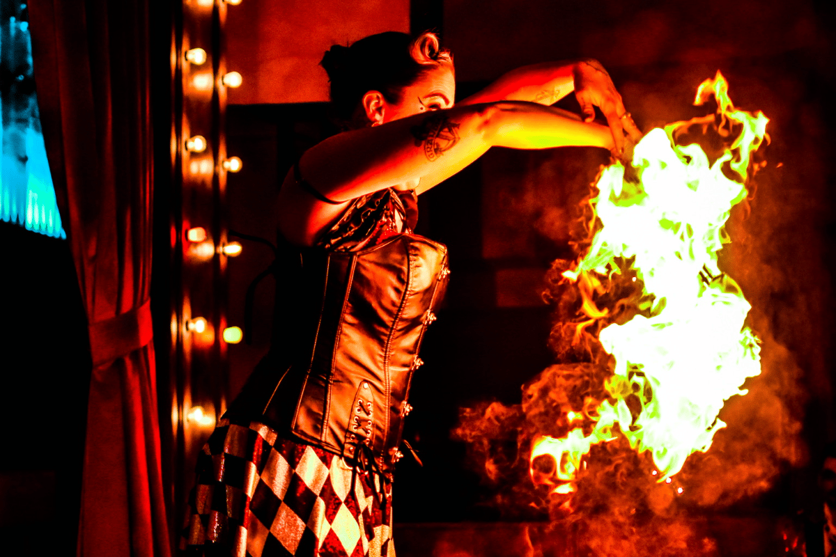 A performer manipulates fire