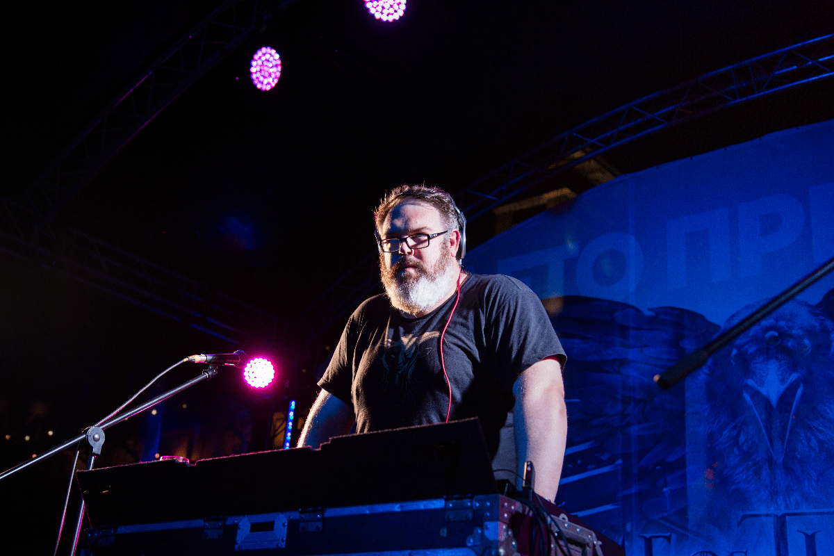 Kristian Nairn mixing music for a show