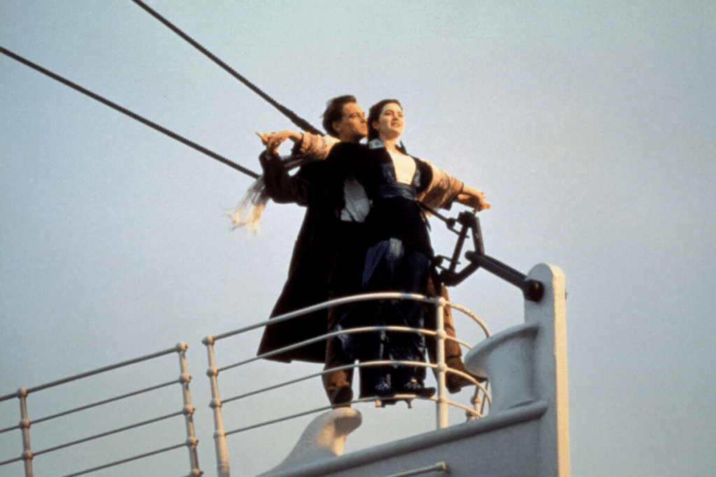 Jack and Rose stand on the bow of the Titanic