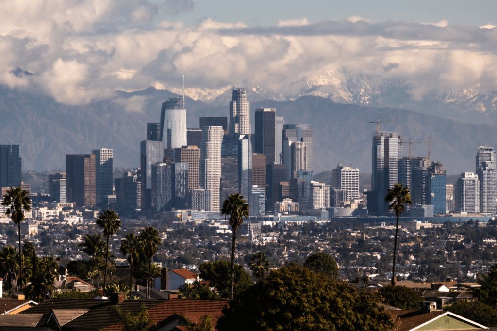 DTLA skyline with snowing mountains