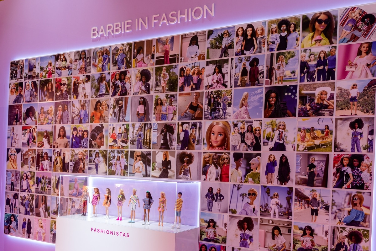 A wall of Barbie photos showing off her fashion