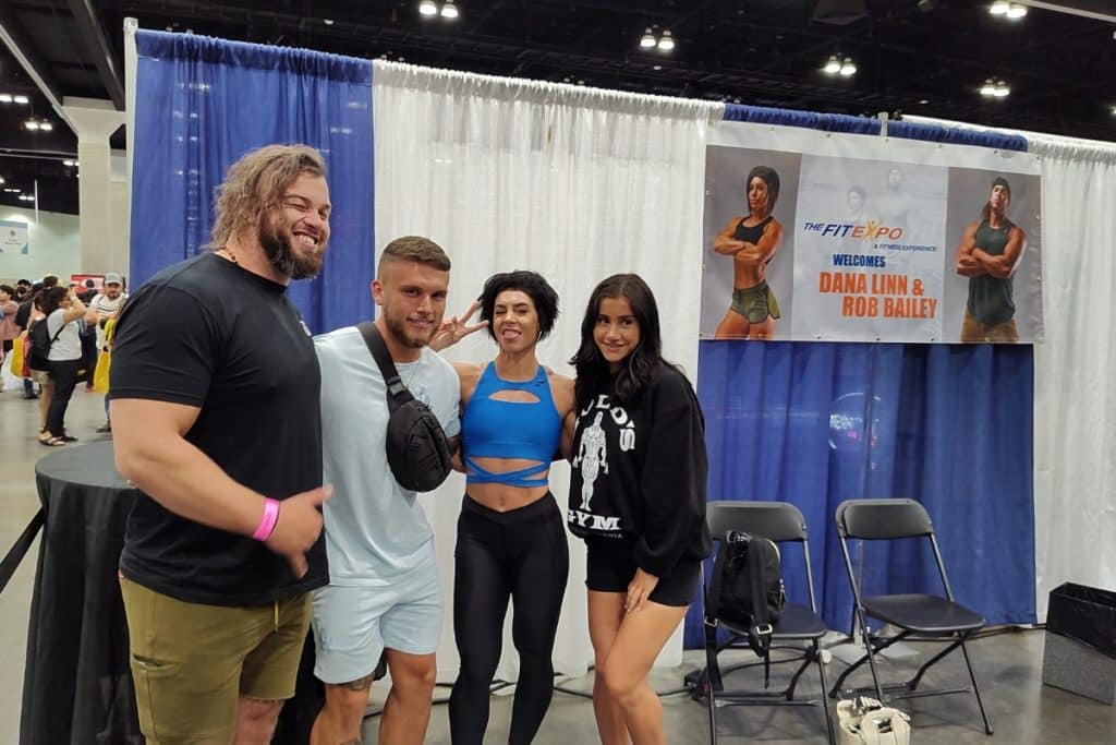People pose for a picture at TheFitExpo