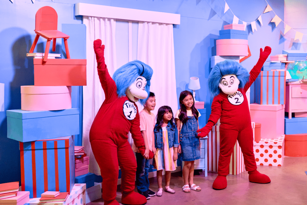 children posing with Thing 1 and Thing 2