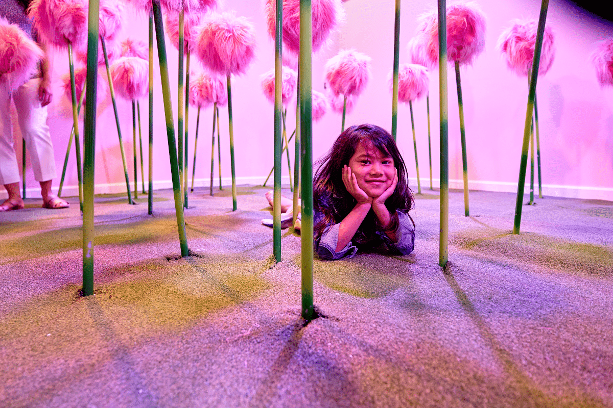 child posing within towering clovers from Horton Hears a Who!