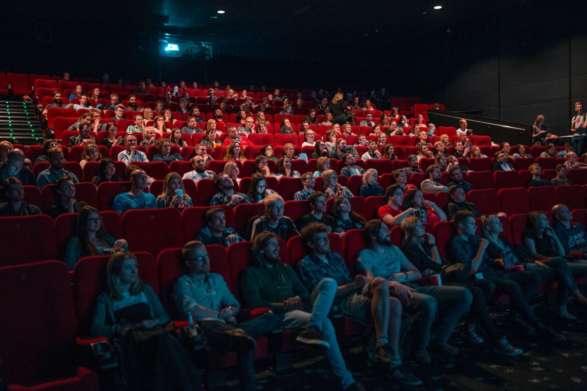 An audience enjoying a film at a cinema.